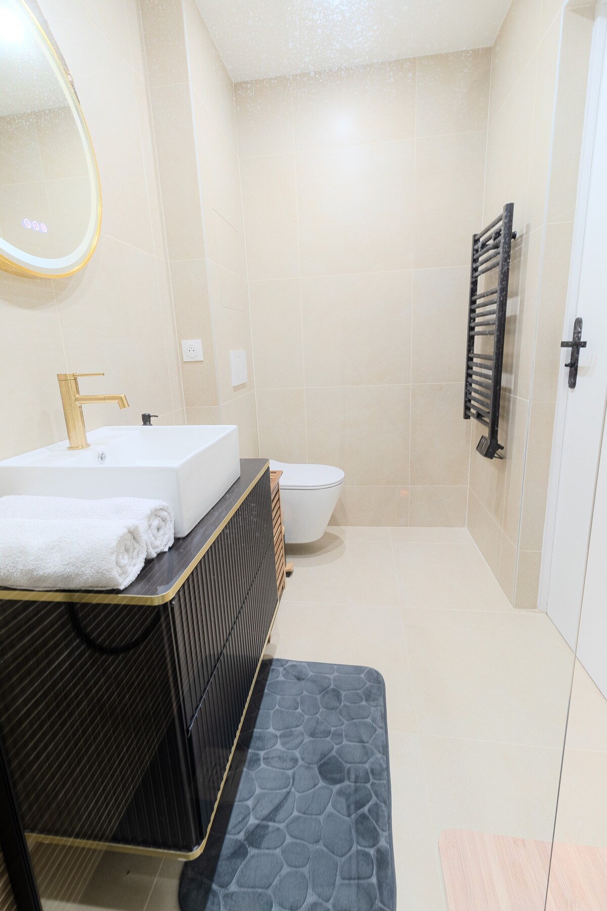 Salle de bain rénovée d'un logement géré